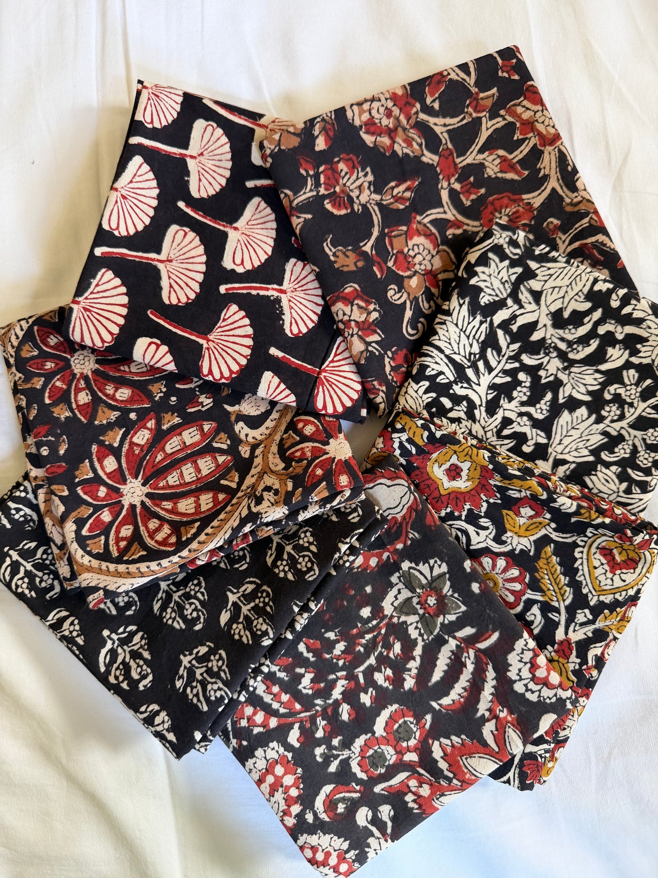 Set of fabric swatches with various patterns on a white background