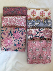 Set of floral patterned fabric swatches on a white background