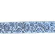Floral lace ribbon with blue flowers on a white background