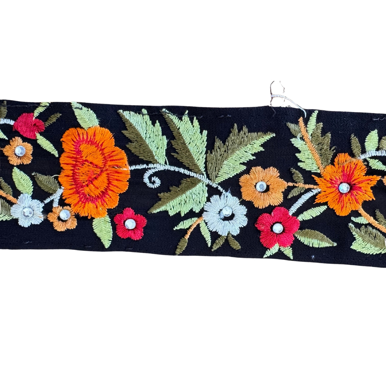 Embroidered floral pattern on a black background