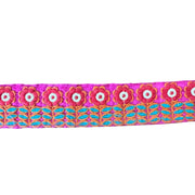 Decorative ribbon with floral pattern on a pink background
