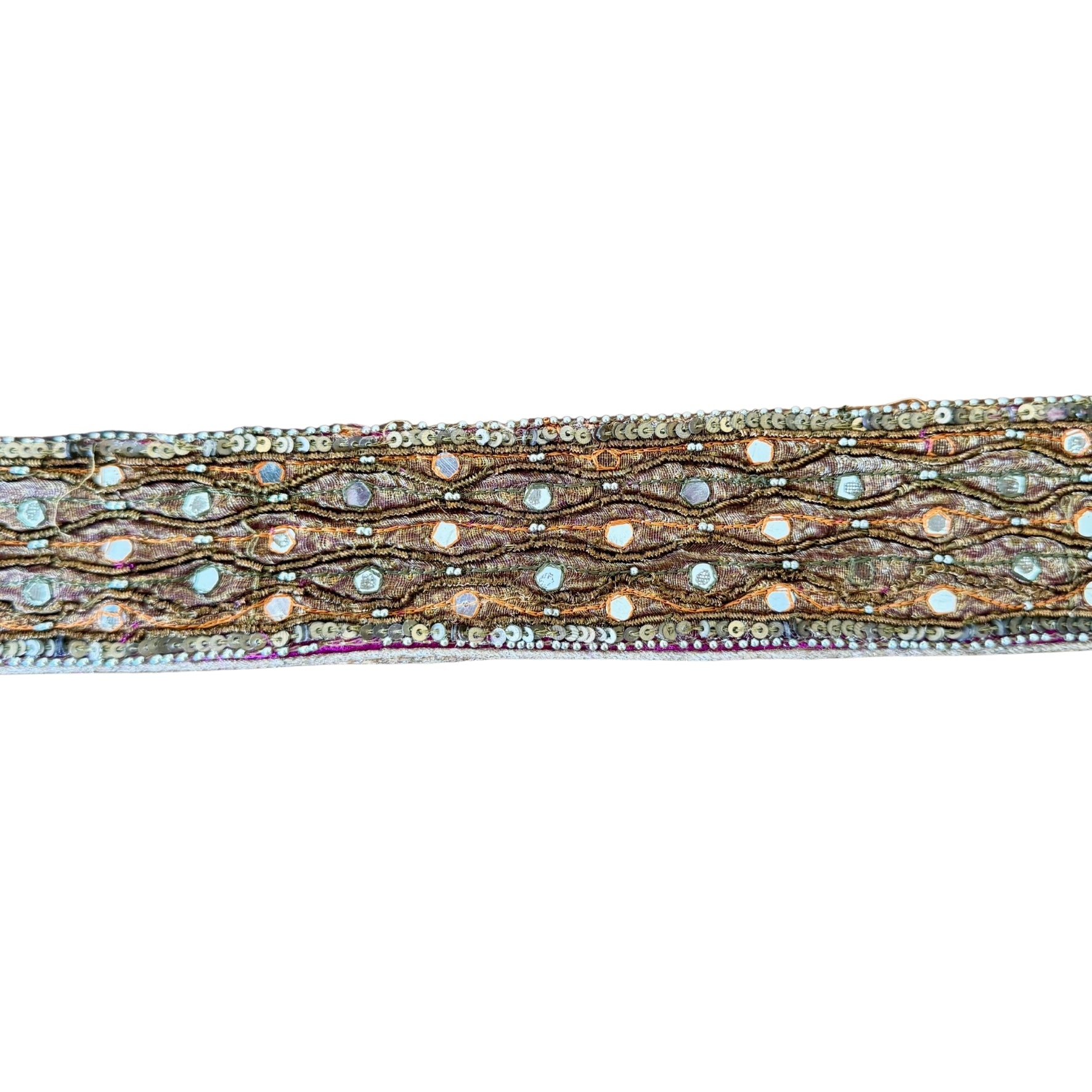 Decorative ribbon with metallic and gemstone pattern on a white background