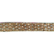 Decorative ribbon with gold and silver pattern on a white background