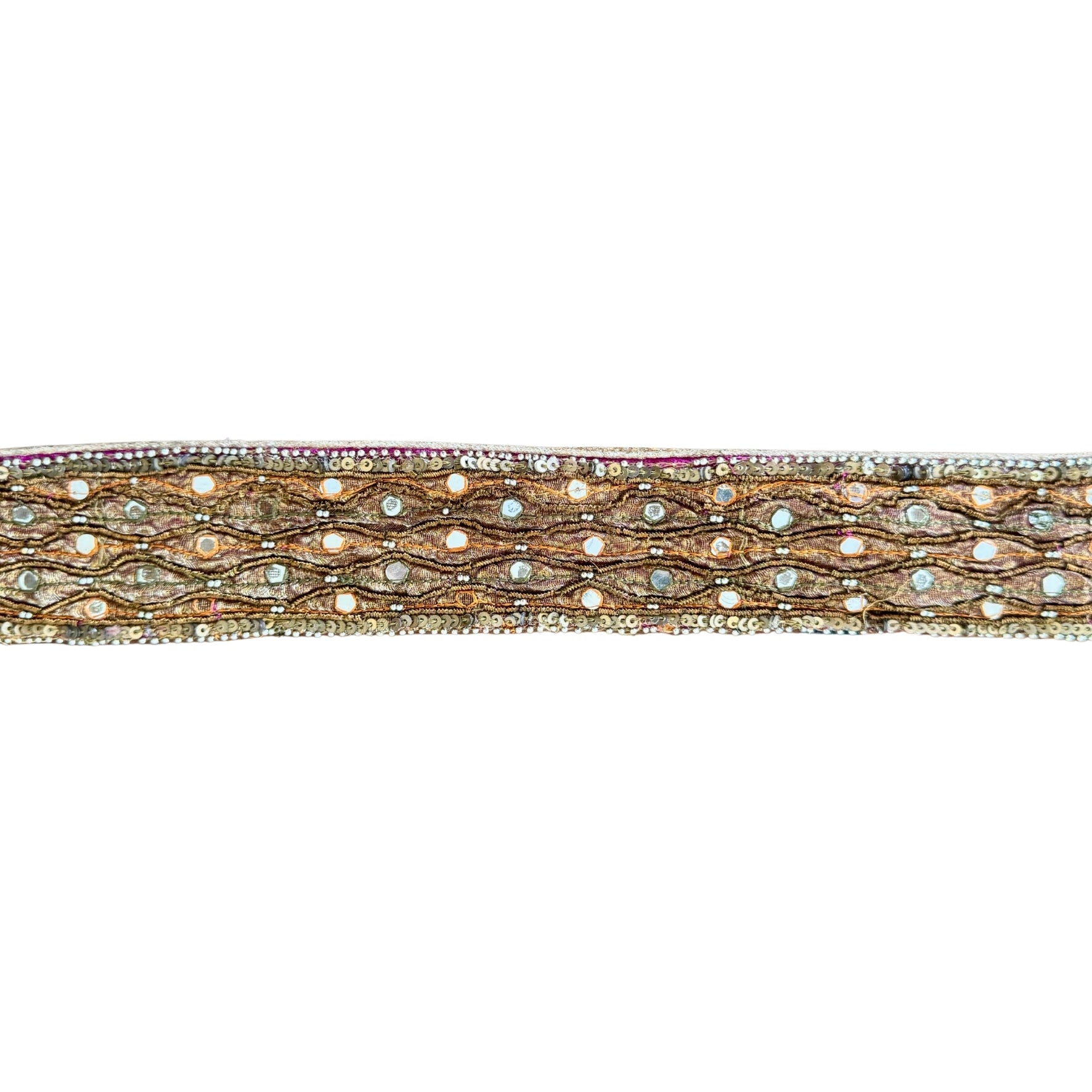Decorative ribbon with gold and silver pattern on a white background