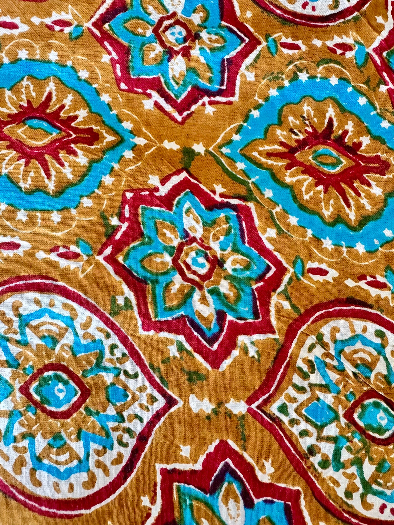 100% Cotton Fabric – Orange With Turquoise & Red Pattern