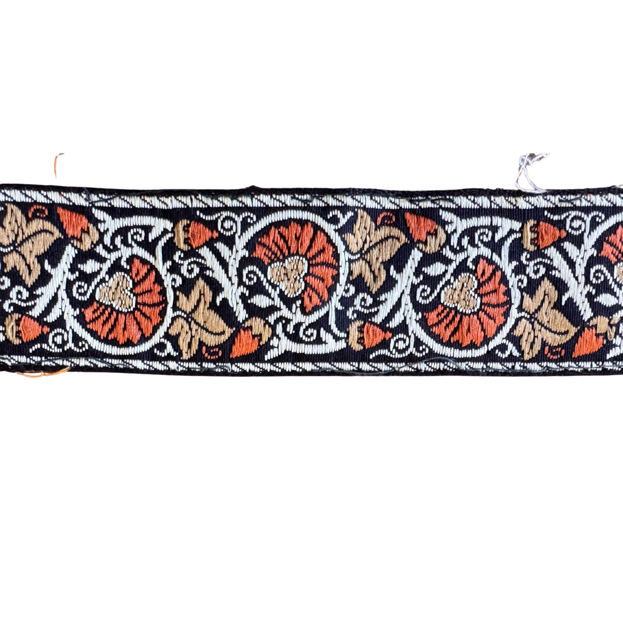 Decorative fabric strip with floral and butterfly patterns on a white background