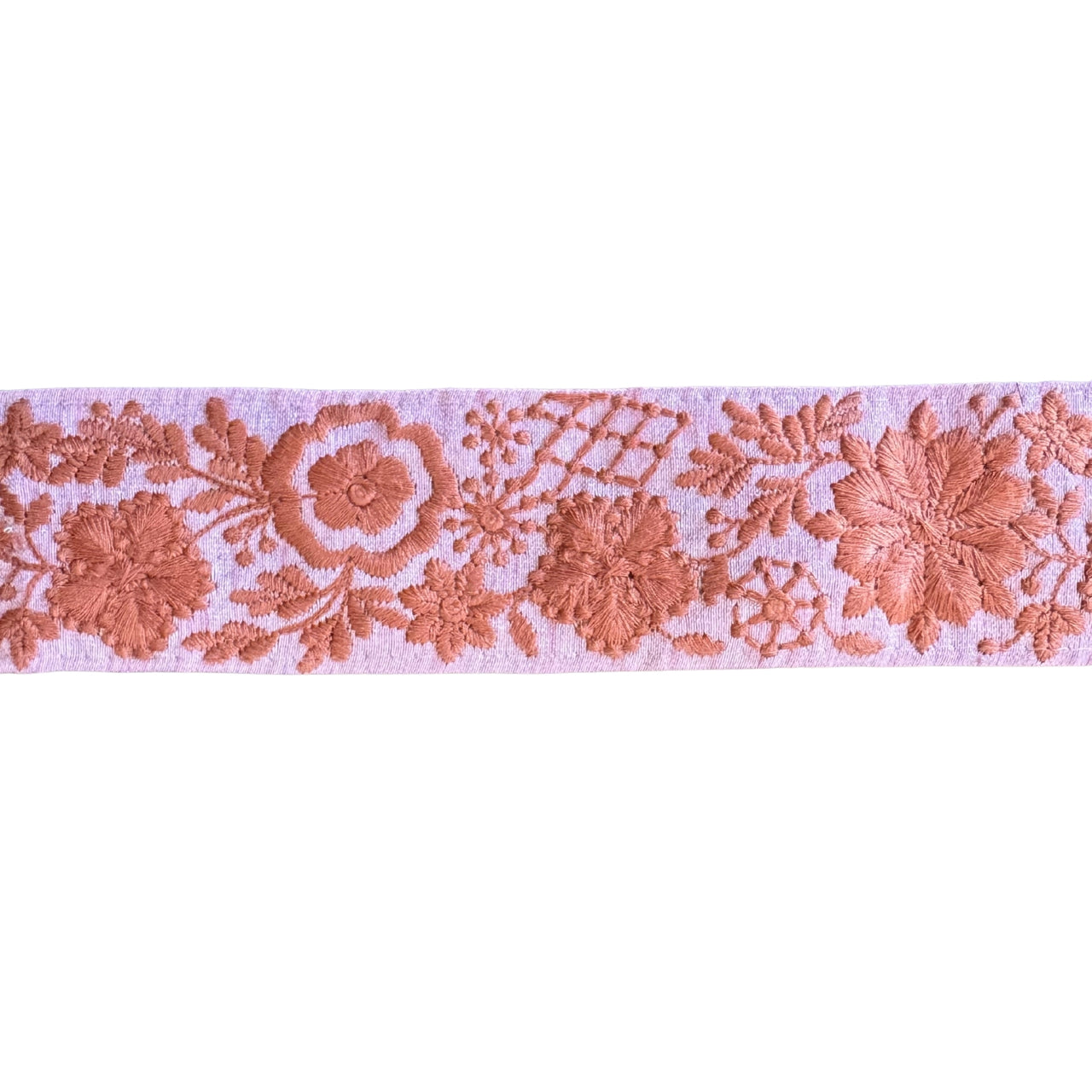 Decorative lace ribbon with floral patterns on a white background
