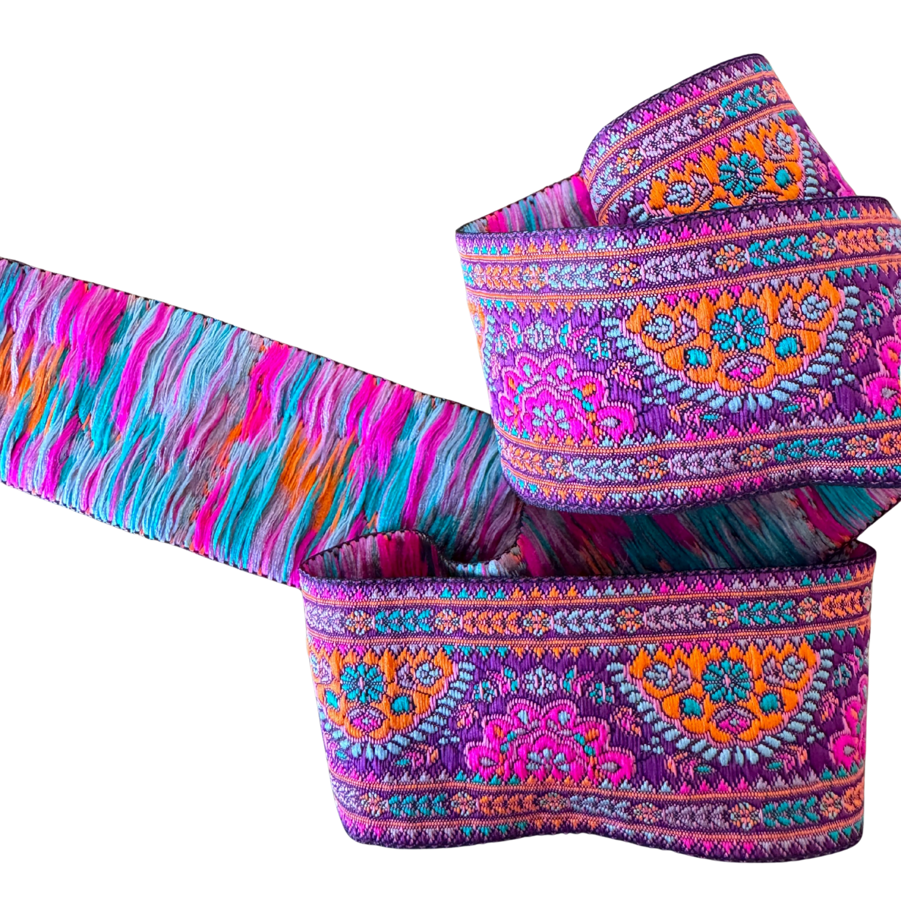 Colorful patterned fabric strip on a white background