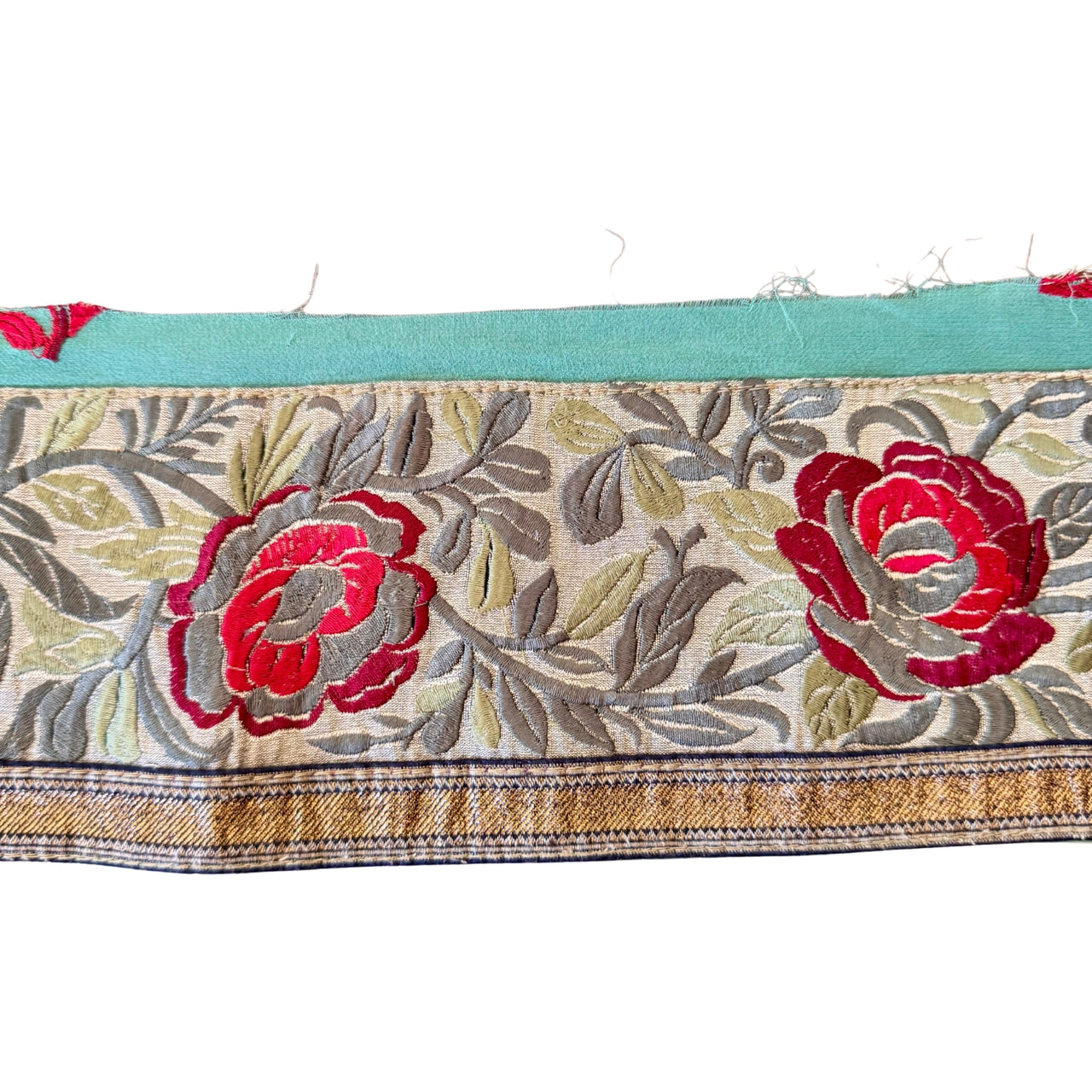 Floral patterned fabric strip with red flowers on a white background