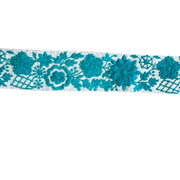 Teal floral lace trim on a white background